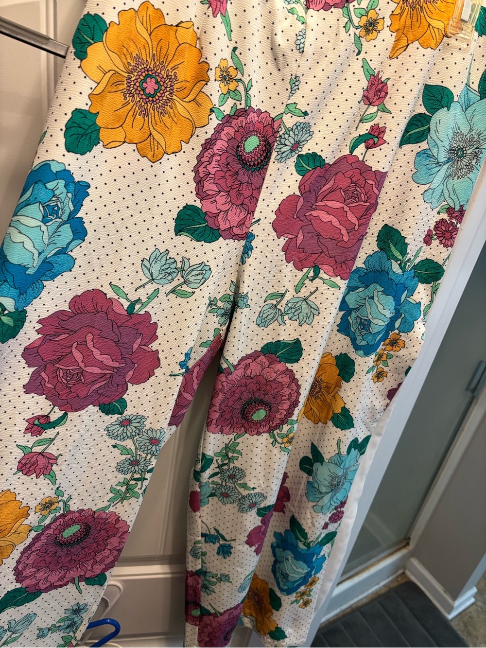 C. Wonder Cream pants with Pink, Blue, Yellow & Green Floral Print